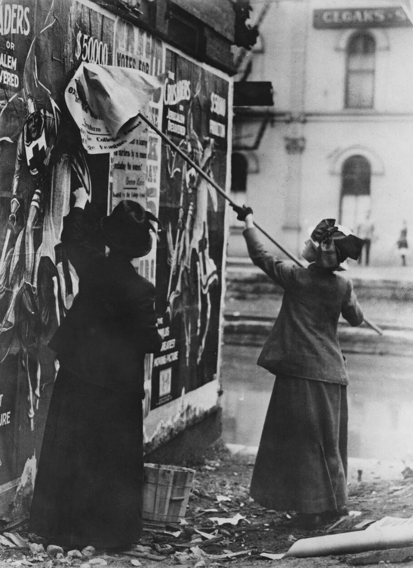 Two Suffragettes Posting A Billboard, New York City, 1917.
