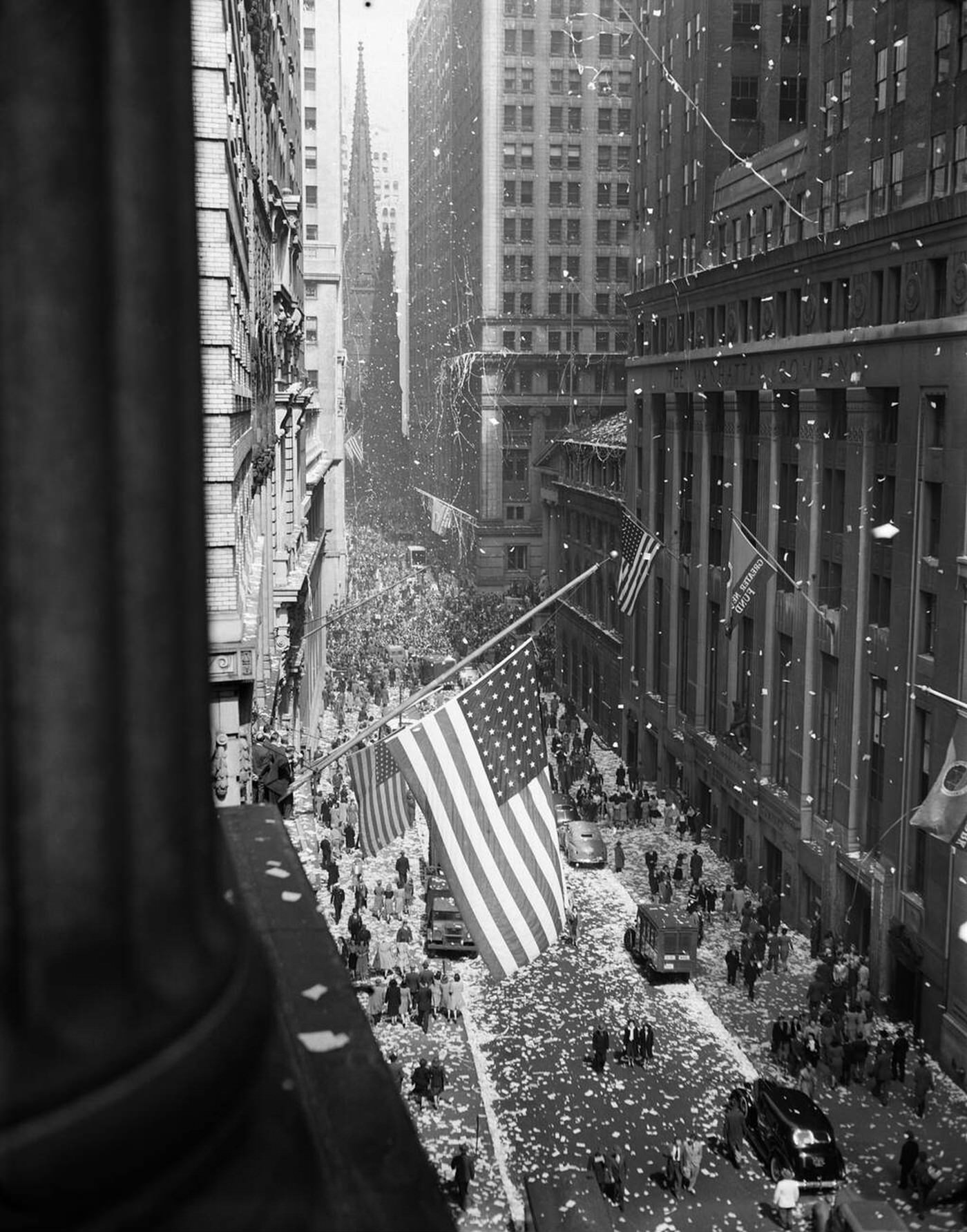 Aerial View Of Ve Day Celebration On Wall Street With Flags And Confetti Flying, 1945.