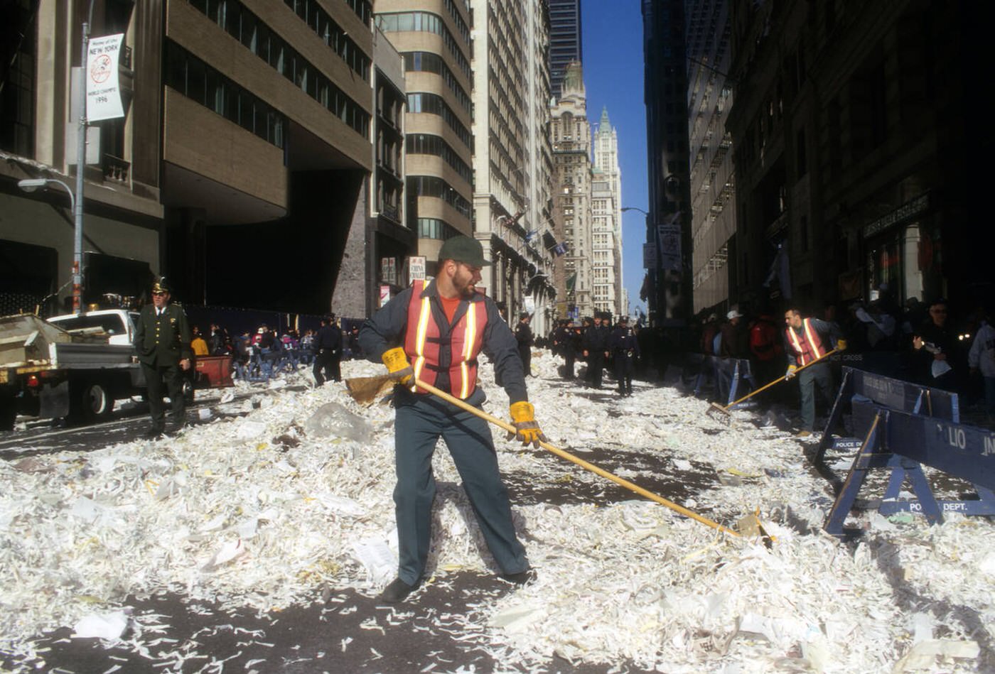 Sanitation Workers Clean Up Ticker Tape On Broadway In Lower Manhattan, 1996.