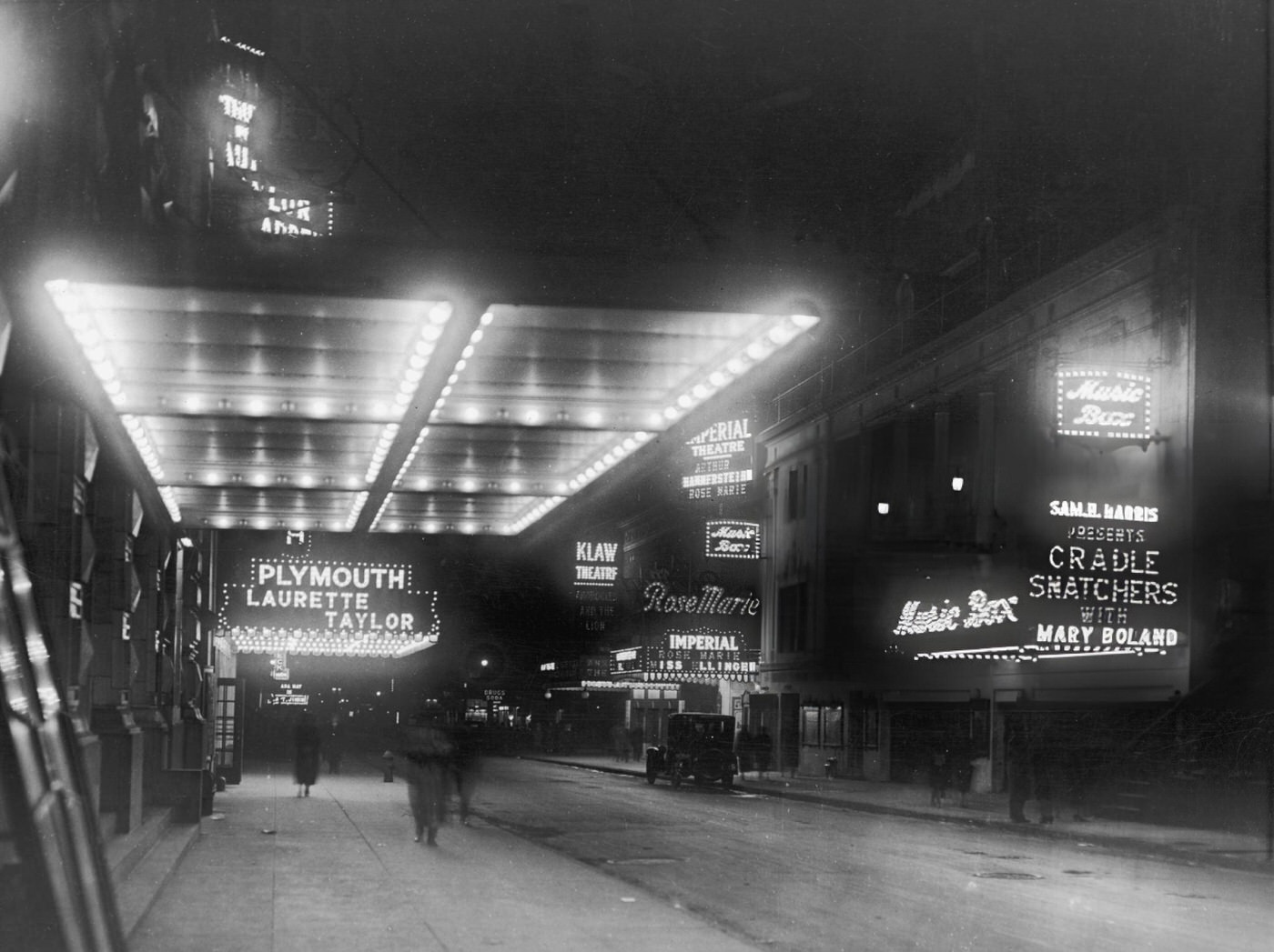 A Car With Wings And A Propeller Drives Through Times Square, New York.