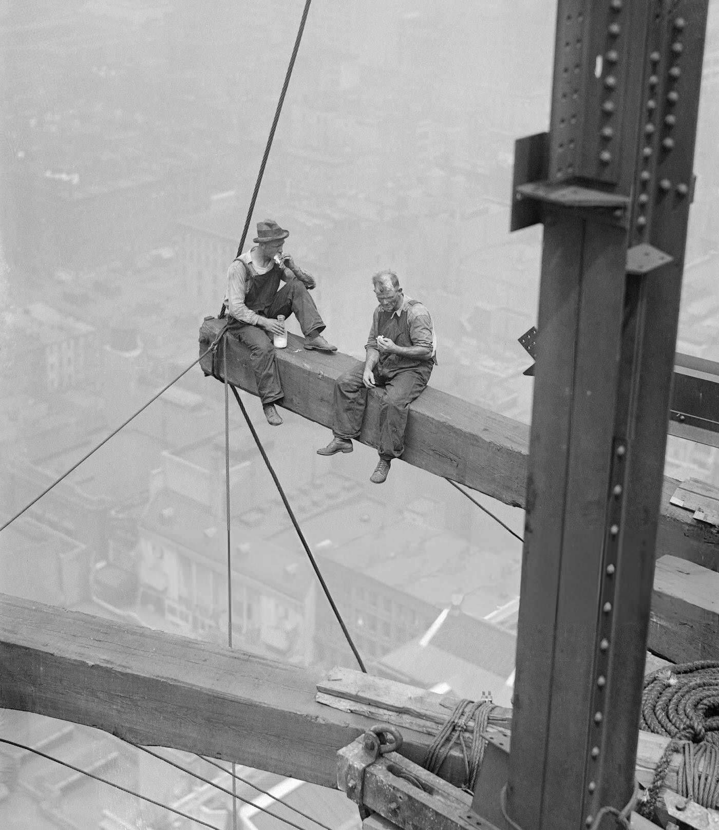 Automobiles And A Streetcar Pass Illuminated Theater Marquees And Billboards At Night In Times Square, 1926.