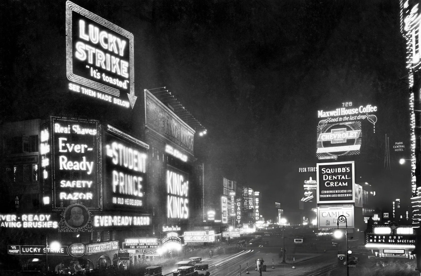 Steel Workers Perched On A Steel Beam During Their Lunch Break During The Construction Of The Paramount Building On Broadway In Times Square.
