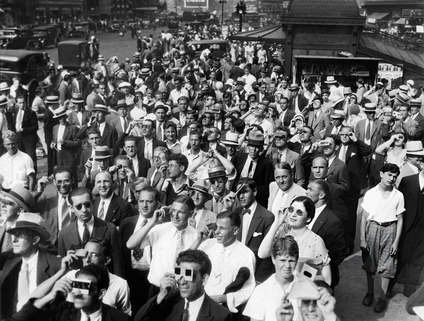 Crowd Watches An Eclipse Of The Sun In Times Square, 1932.
