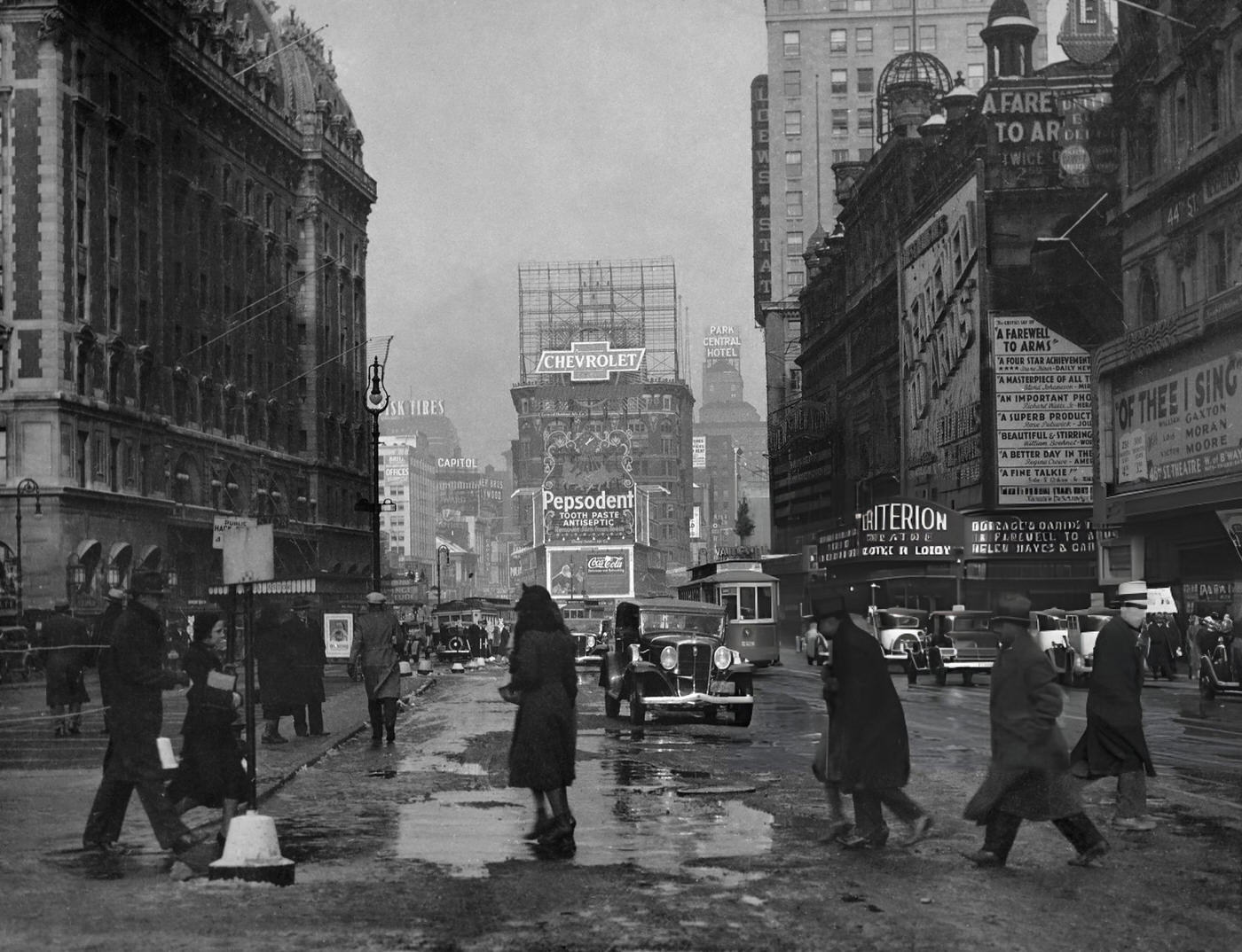 Pedestrians And Traffic On A Rainy Day In Times Square, 1932.