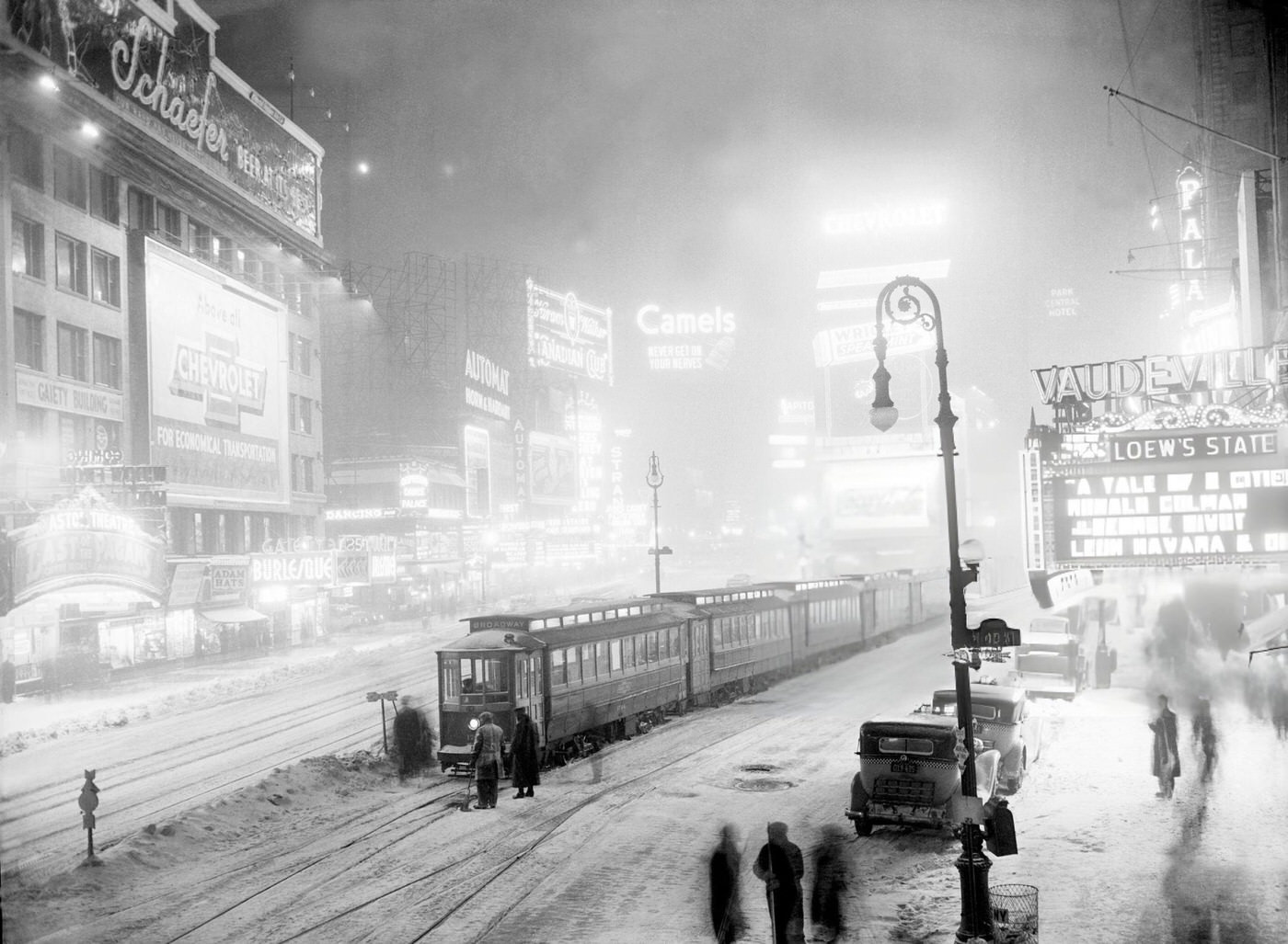 Streetcars Stuck At W. 45Th St. In Times Square Due To A Frozen Switch During A Snowstorm, January 1936.