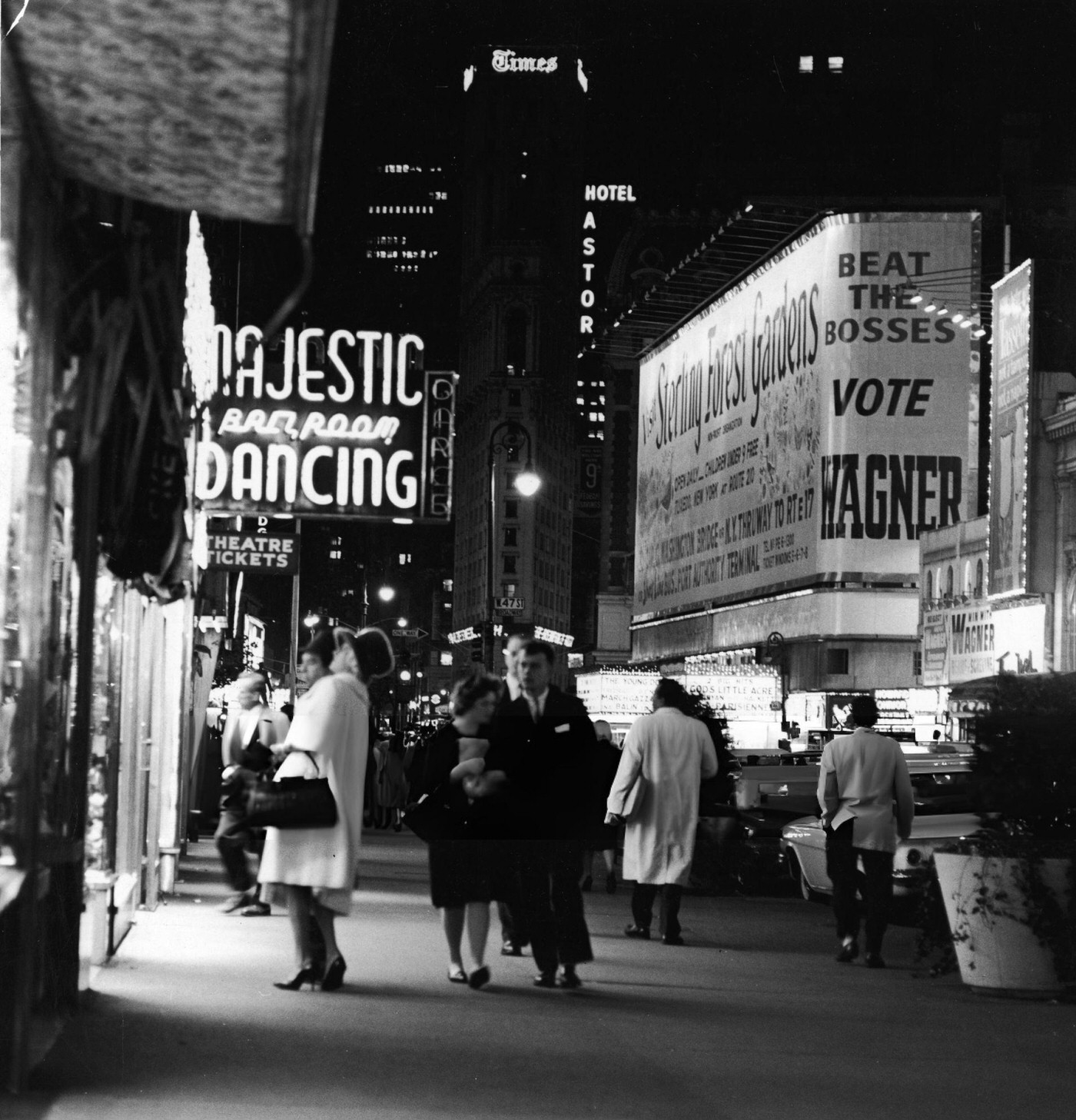 A Night Street Scene At 47Th Street Near Times Square, Showing Nightclub And Theatre Signs, Circa 1958.
