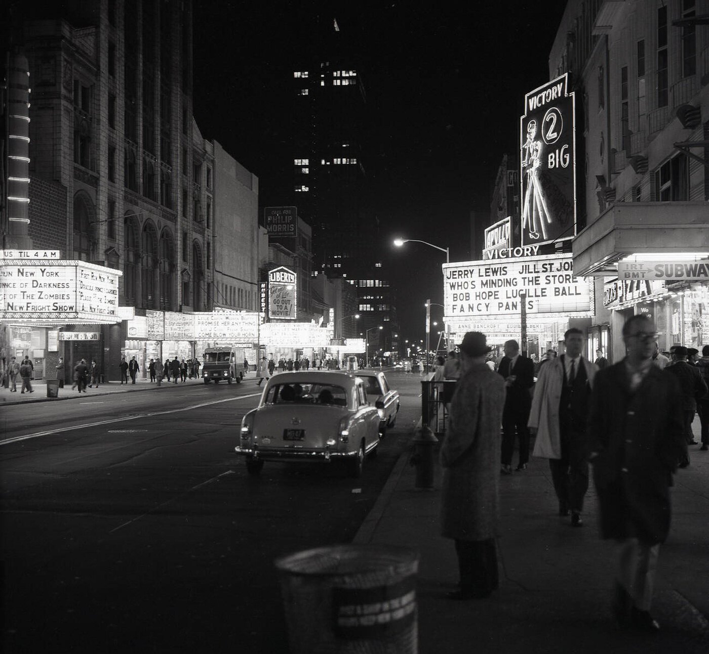 A View Of Times Square In The Evening Showing Movie Theatres Featuring Some Of The Biggest Film Stars Of The Era, 1950S.