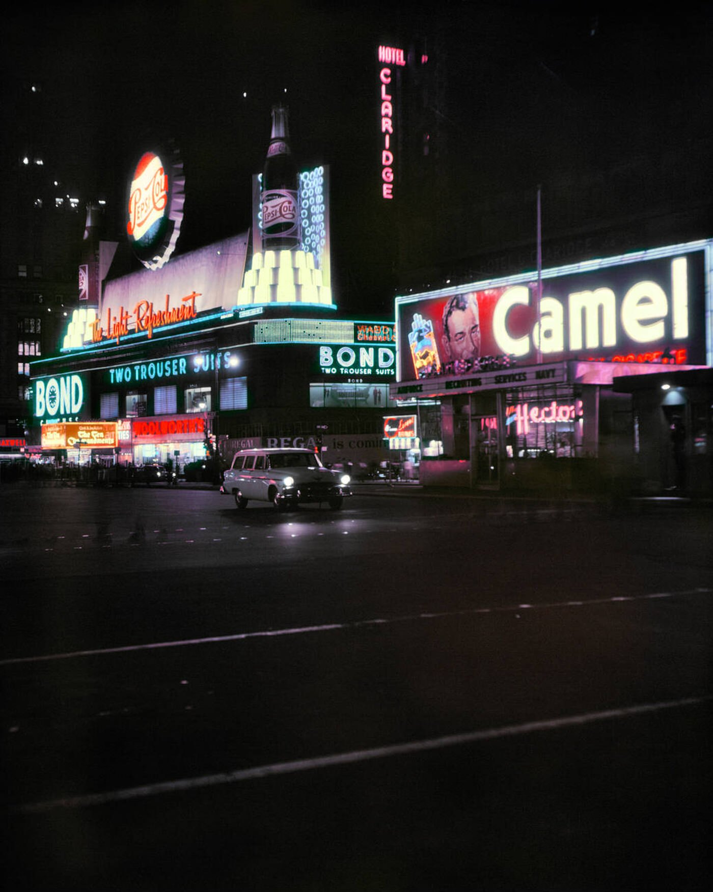 Times Square With Neon Signs For Pepsi And Camels, And A Marquee For 'The Ten Commandments', 1957.