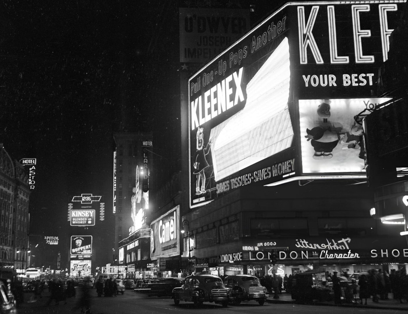 Times Square At Night Is A Bit Dimmer Than Usual During A Brownout Caused By Coal Shortage, 1950S.