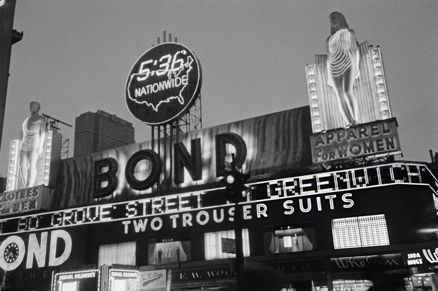 The Bond Clothing Store On Broadway In Times Square, Selling 'Two Trouser Suits', 1952.