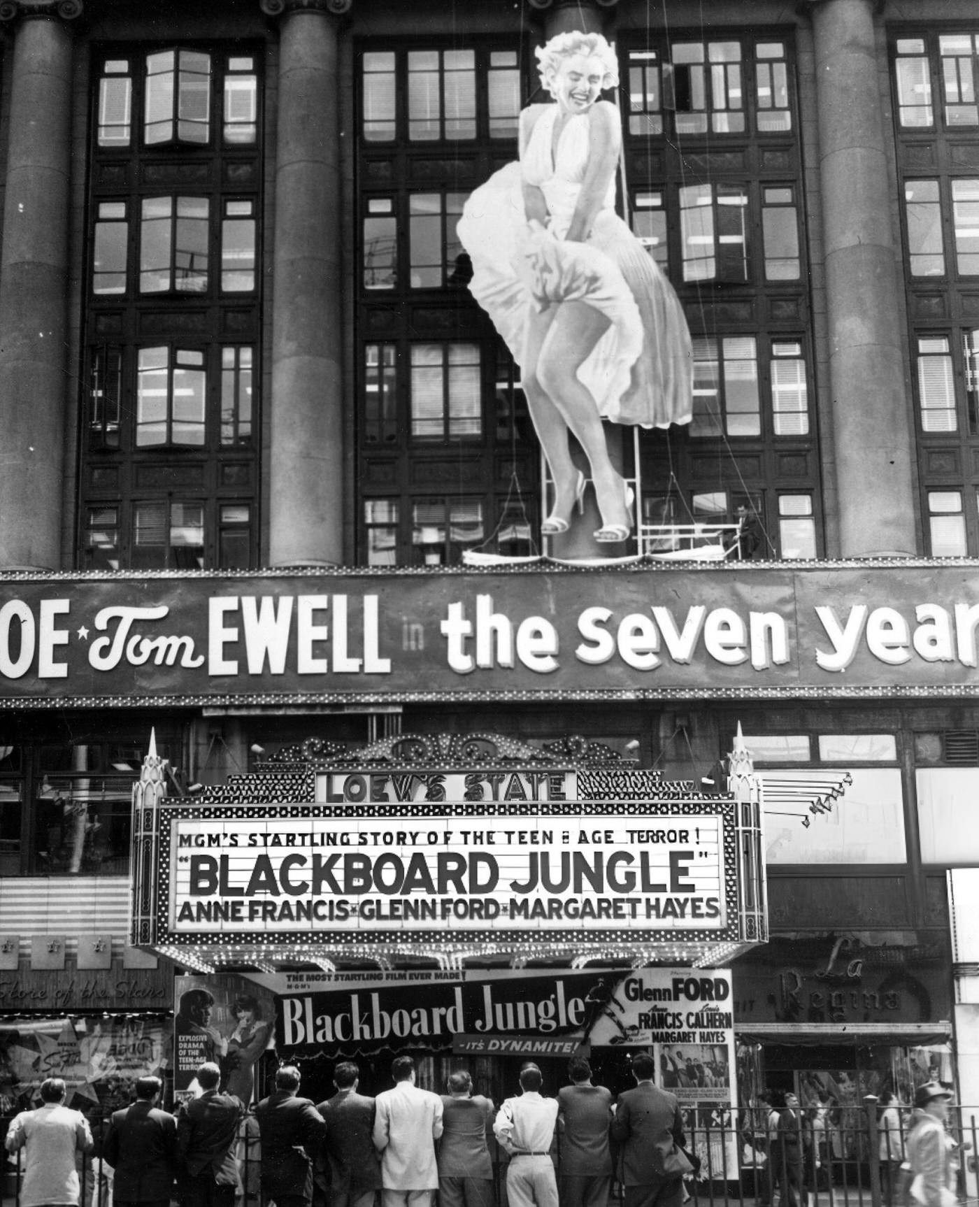 A Crowd Stands In Front Of Loew'S State Movie Theater In Times Square With A Cut-Out Of Marilyn Monroe From &Amp;Quot;The Seven Year Itch&Amp;Quot;, 1955.