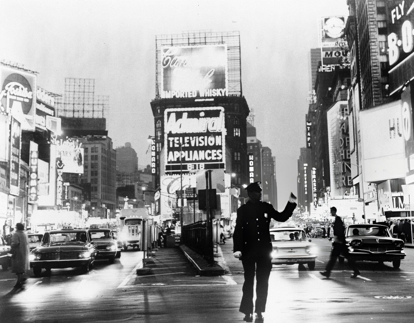 A White-Gloved Policeman Directs Traffic At 7Th Avenue And 42Nd Street In Times Square, 1967.