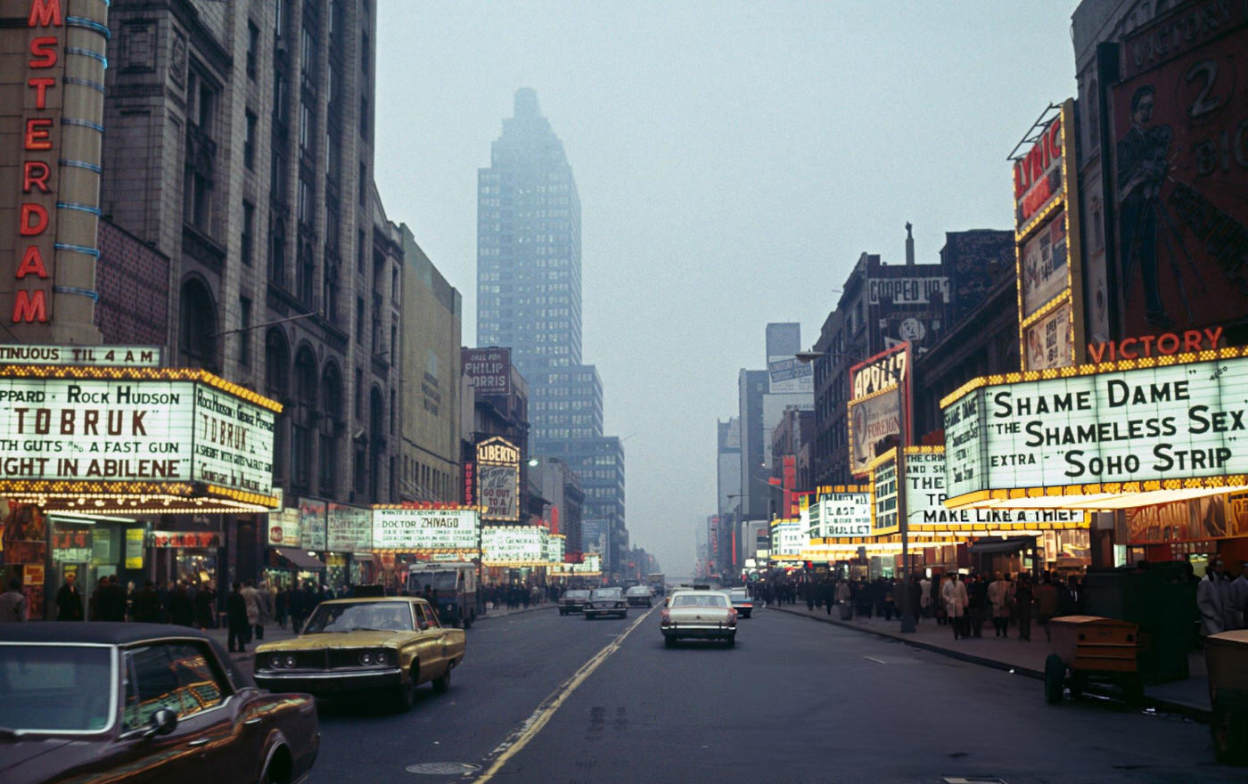 View Of 42Nd Street At Times Square With Marquees Above Cinemas Advertising Hollywood And Pornographic Films, April 1967.