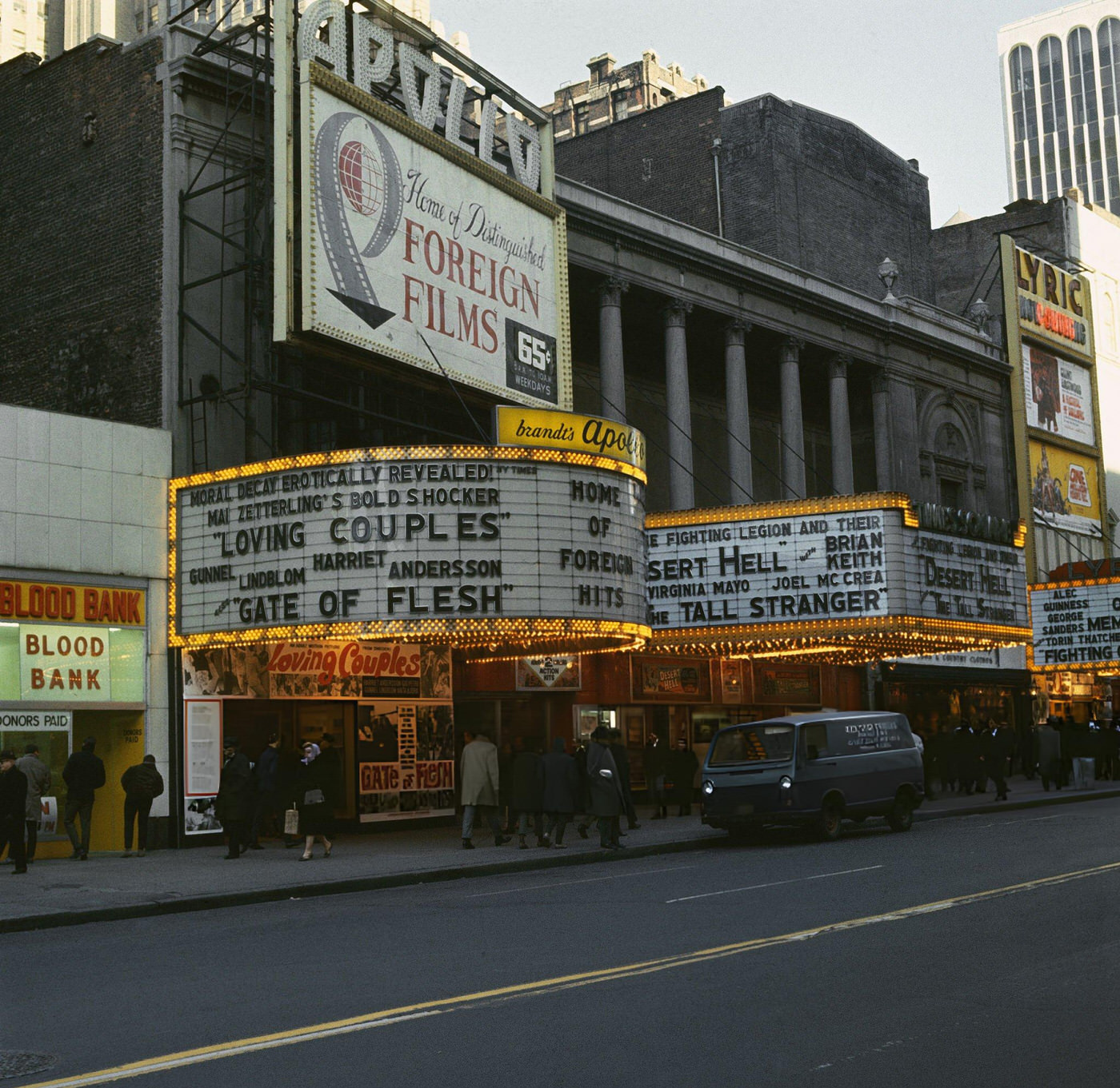 Times Square Area With Souvenir Shops, Movie Theaters, And Book Stores, Showing A Marquee Advertising Erotic Films.