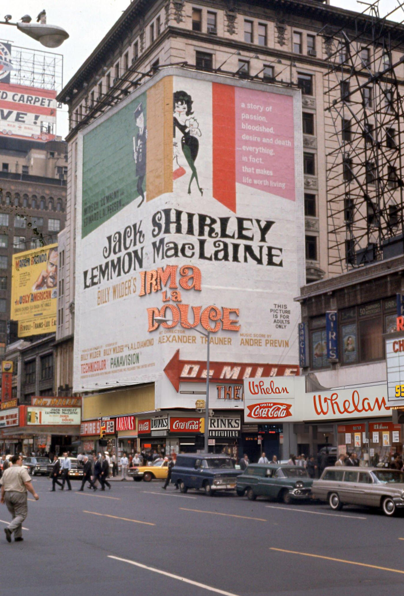 Huge Movie Billboard For Irma La Douce Hangs Over Seventh Avenue In Times Square, June 1, 1963.