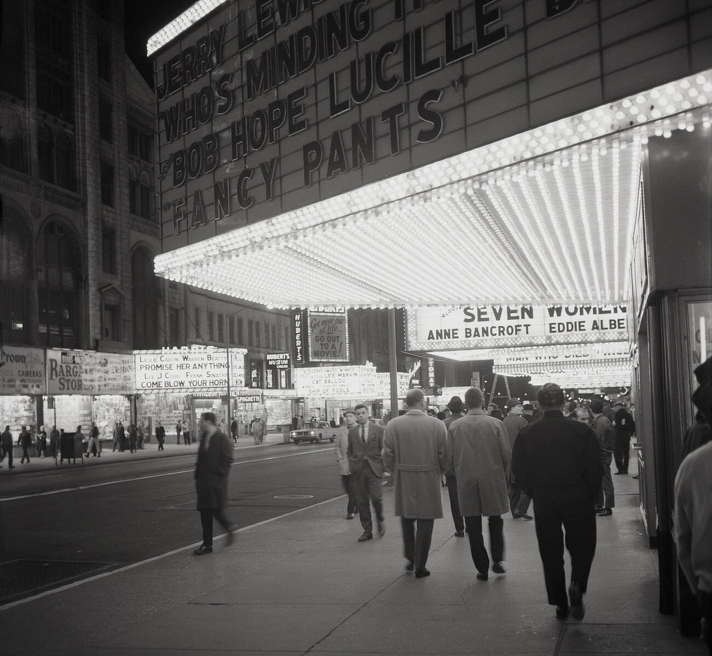 Evening Time At Times Square, Showing Neon Lights Of Cinemas And Theatres, 1963.