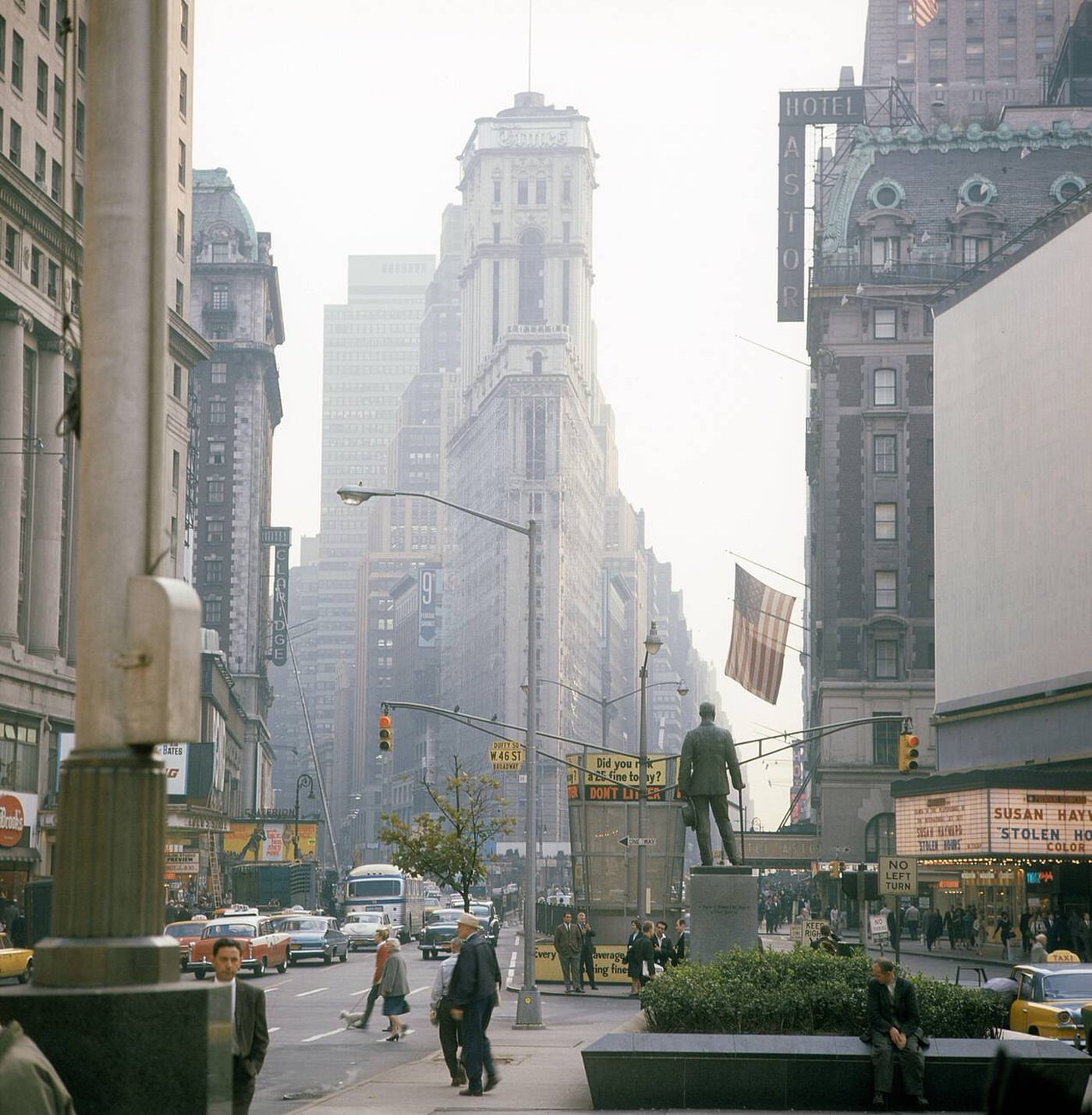 Street Scene With Cars And Taxis Driving On Broadway In Times Square, Showing The Movie Theatre Promoting 'Stolen Hours', 1964.