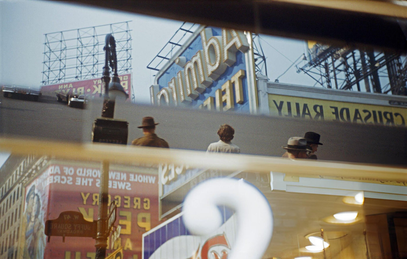 Reflections Of People And Billboards In Times Square, 1961.