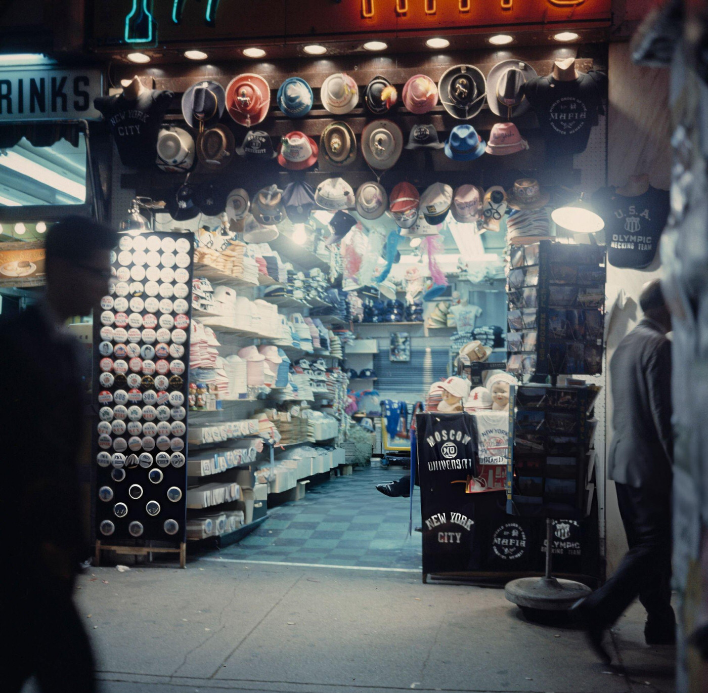 A Souvenir Shop Selling Hats, T-Shirts And Badges In Times Square, Circa 1962.