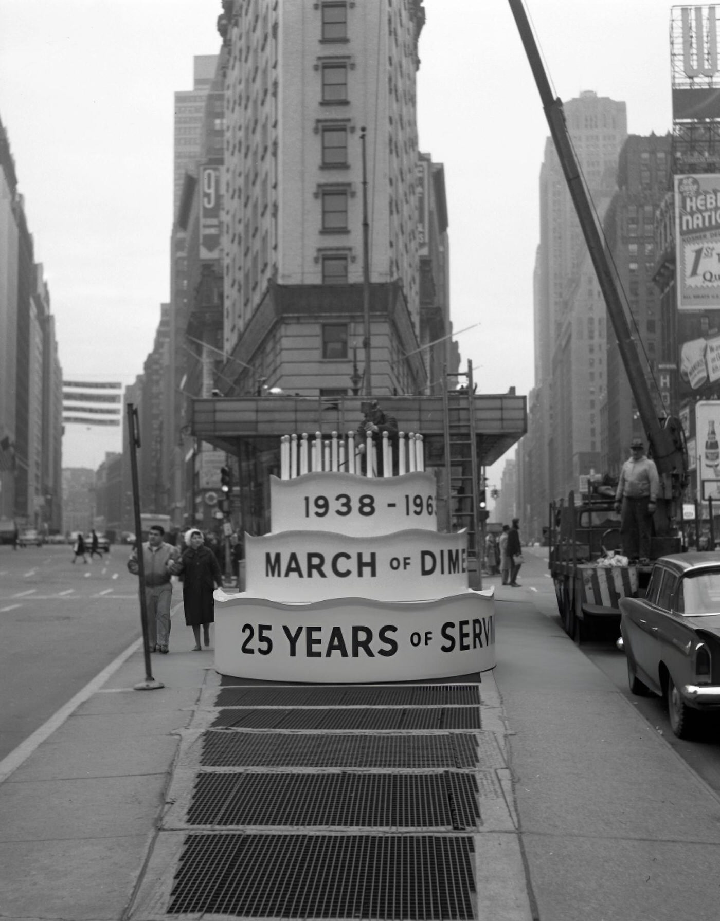 A Construction Crew Sets Up A March Of Dimes Mock Birthday Cake In Times Square, January 1, 1963.