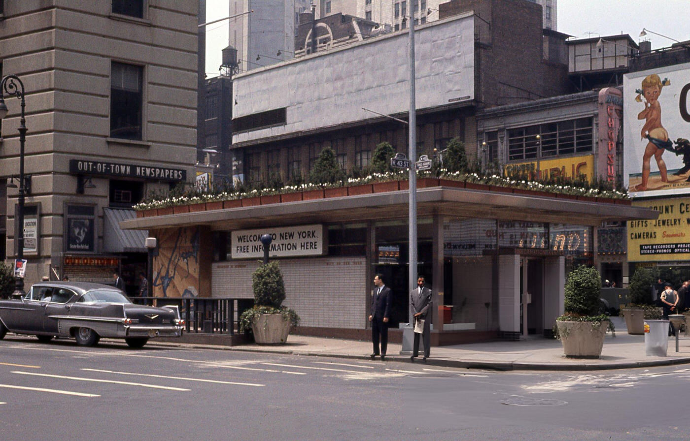 Two Men Wait To Cross The Street At The Intersection Of West 43Rd Street And Broadway In Times Square, June 1, 1963.