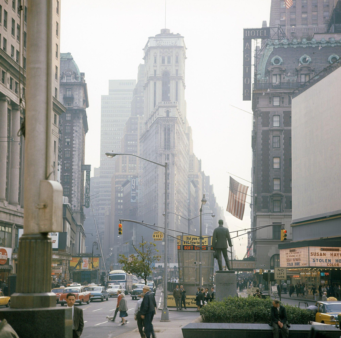 A Street Scene With Cars And Taxis Driving On Broadway In Times Square, Showing The Metropole Cafe, 1964.