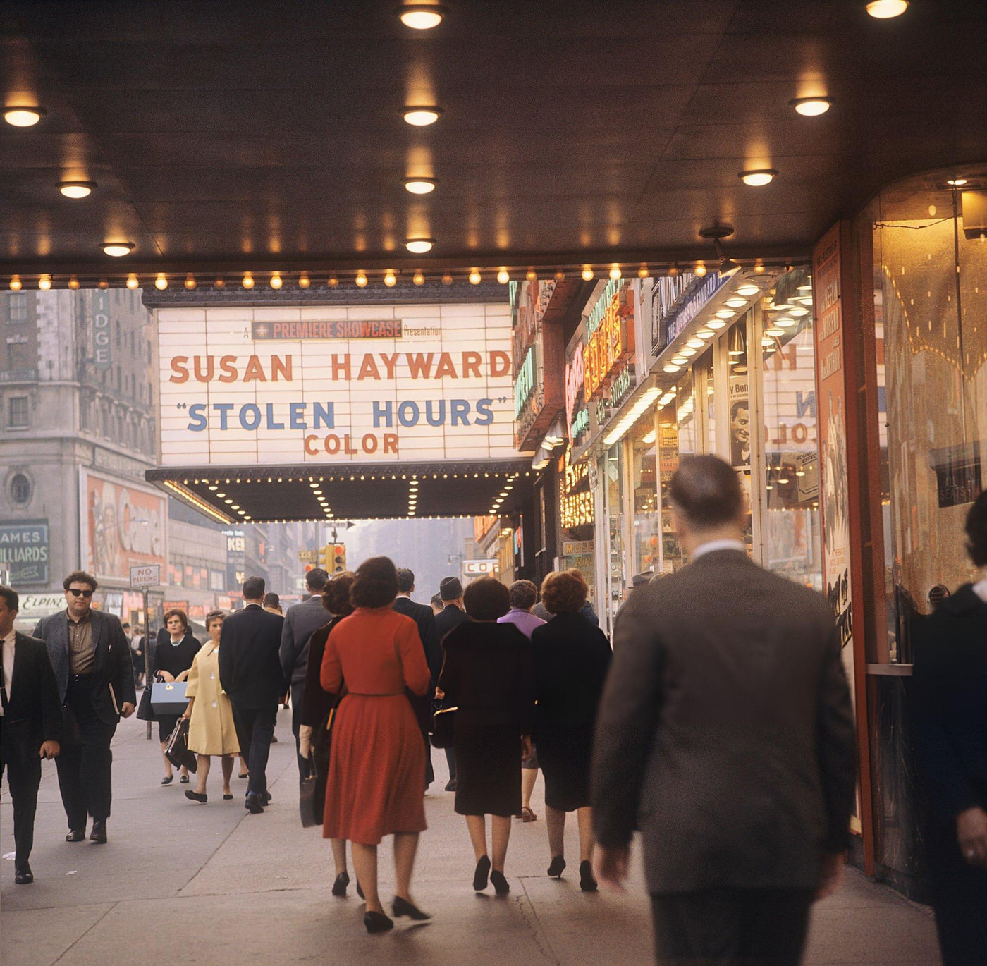 A Street Scene On Broadway In Times Square, Showing The Sign Outside The Movie Theatre Promoting 'Stolen Hours', 1964.