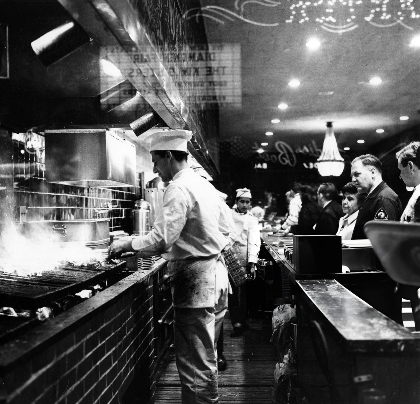 Cooks Broil Steaks On Charcoal Pits At Tad'S Steak House In Times Square, 1965.
