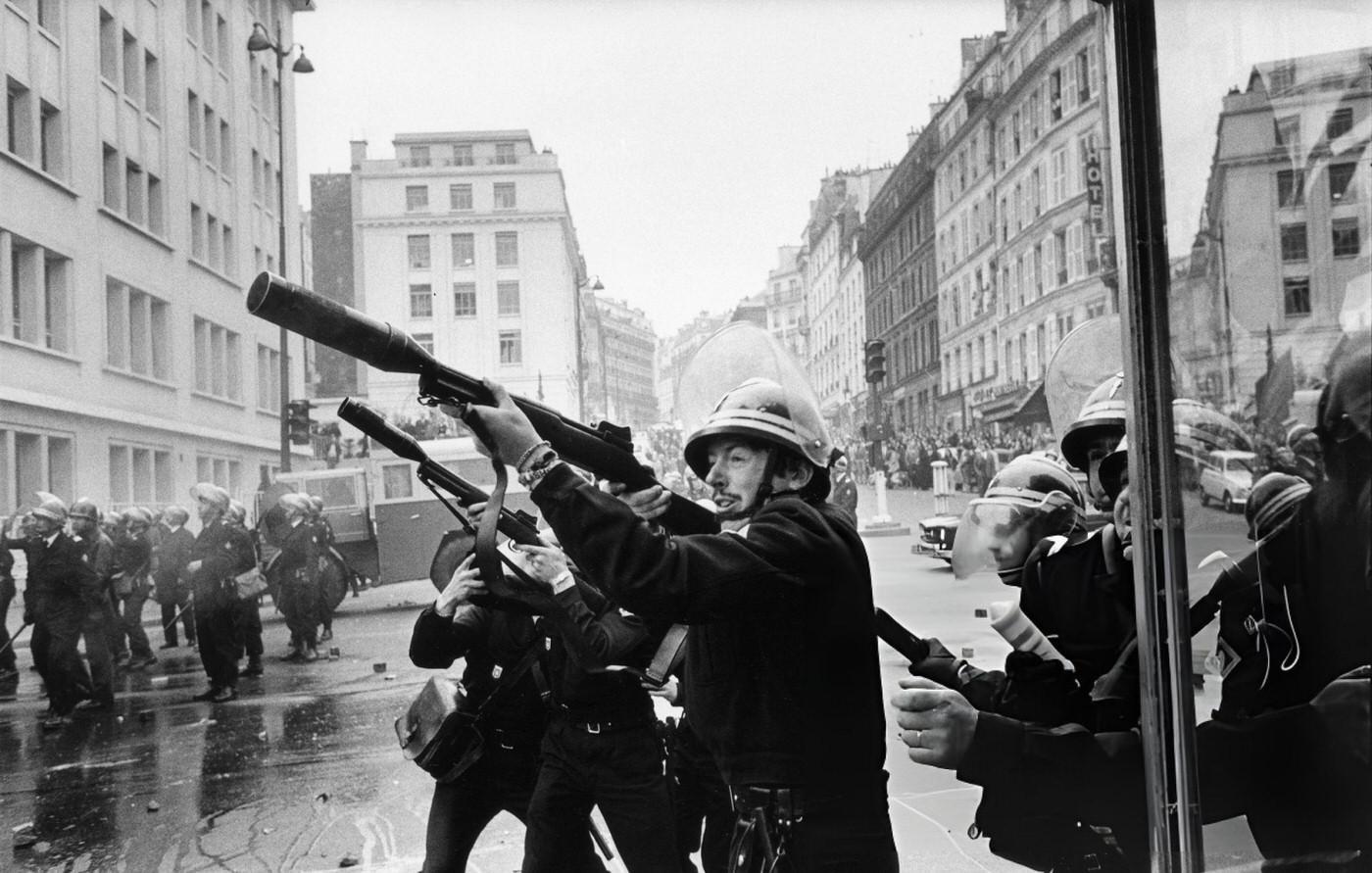 Pedestrians And Traffic On Times Square, With Commercial Signs And Advertisements On The Buildings, 1962.