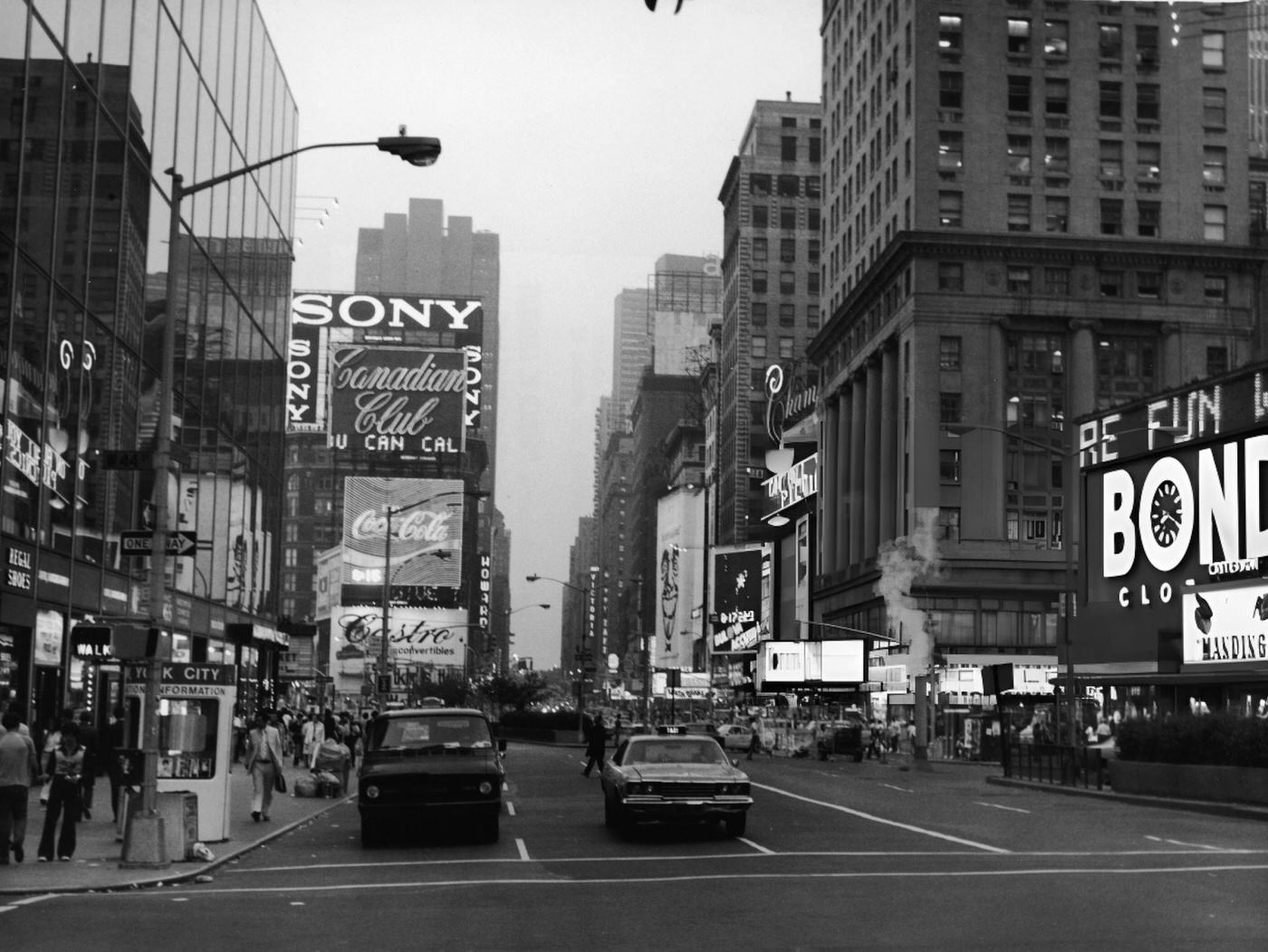 A Street Scene With Cars, Buses And Taxis Driving On Broadway In Times Square, 1964.