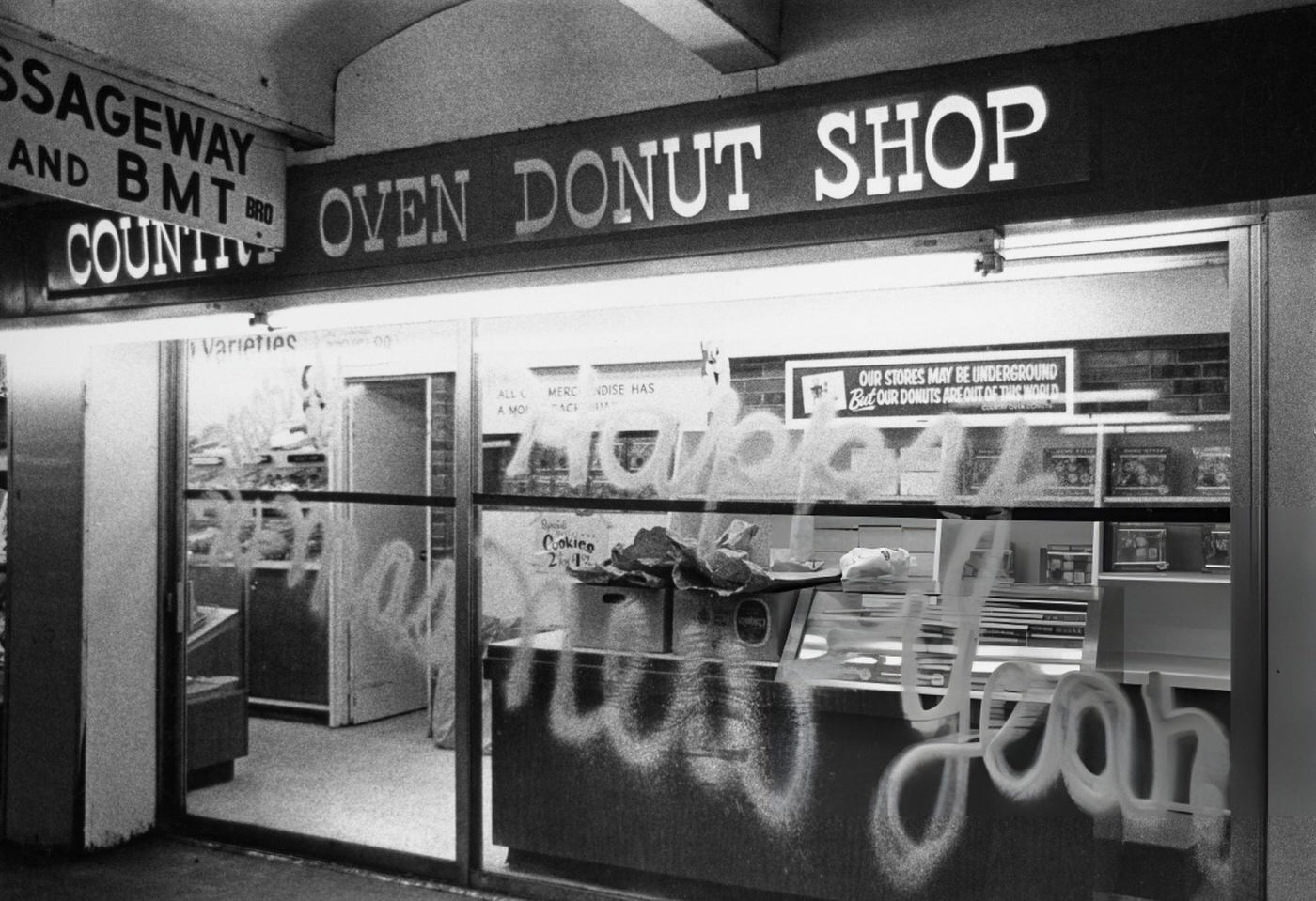 A Street Scene With Cars, Buses And Taxis Driving On Broadway In Times Square, Showing Movie Theatres, 1964.