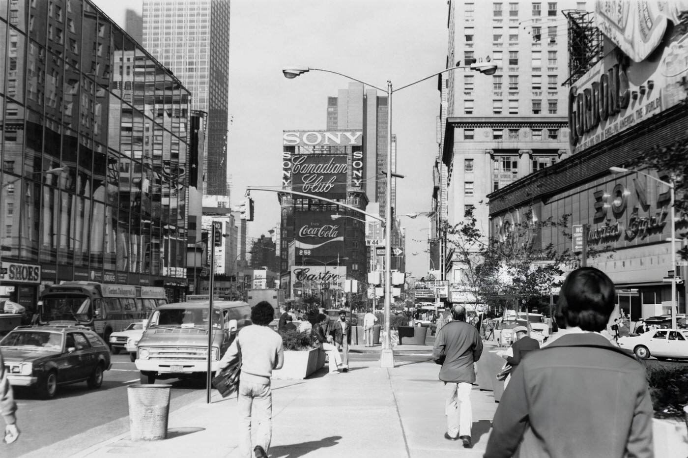 A Policeman Directs Traffic In Front Of The Neon Billboards Of Times Square, Circa 1965.