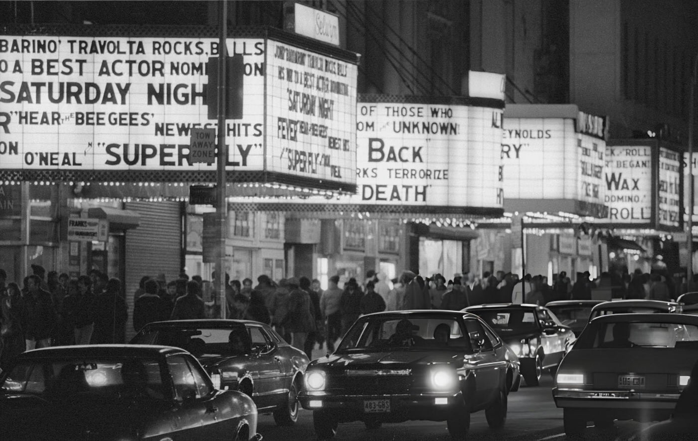 High-Angle View Of The Allied Chemicals Building Illuminated As Evening Falls Over Times Square, December 10, 1965.