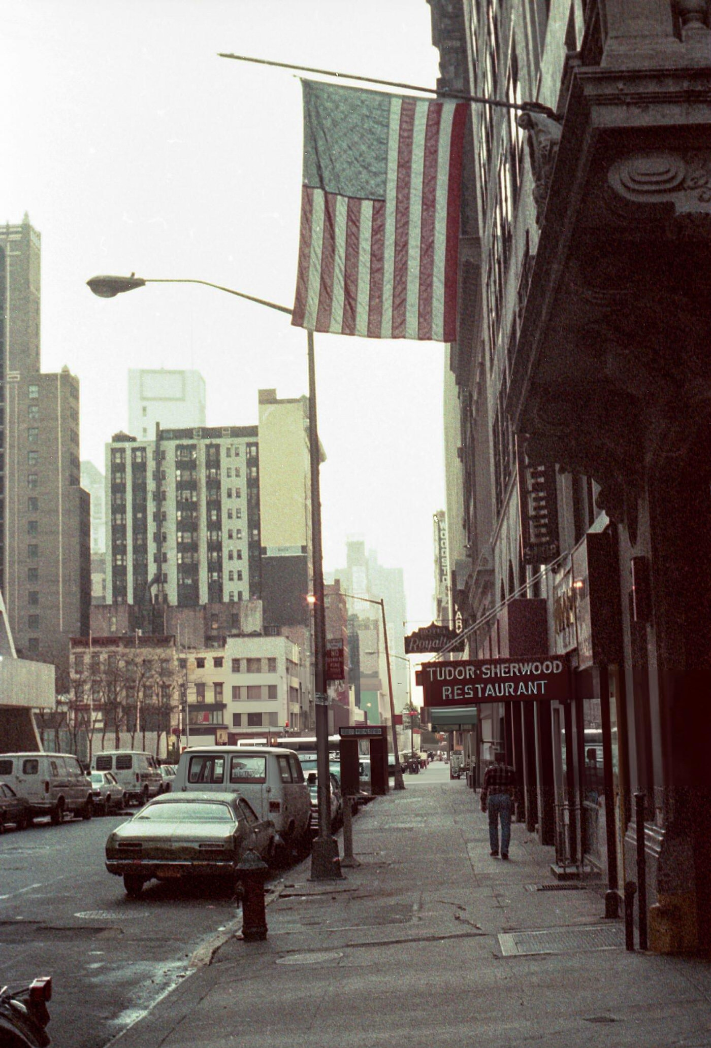 An American Flag Hanging From A Building On West 44Th Street In Times Square, 1984.