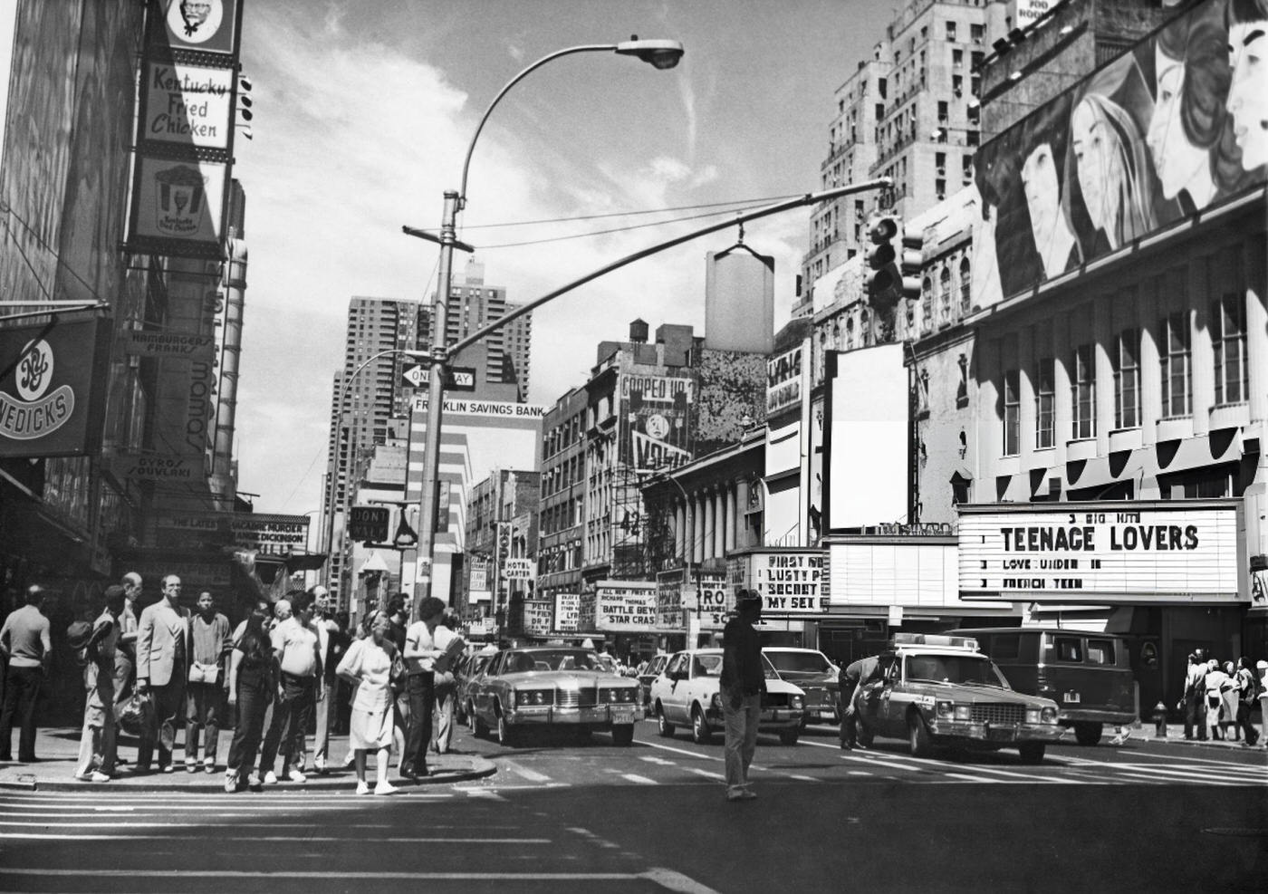 Pedestrians Walk Along 42Nd Street With Adult Film Theaters Visible, September 1980.