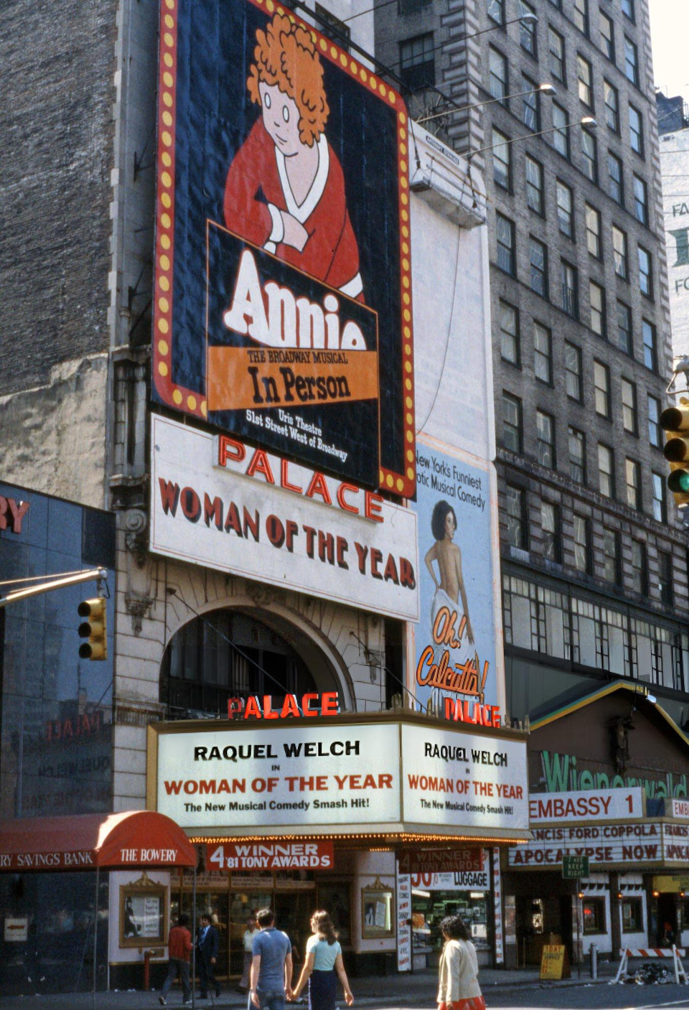 Exterior View Of The Palace Theater On Broadway In Times Square, Advertising Raquel Welch In 'Woman Of The Year', July 1982.