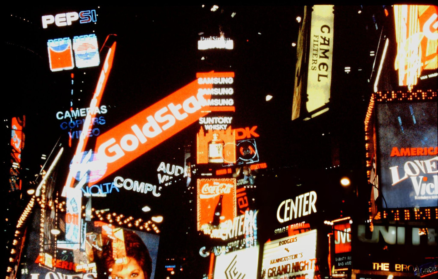Vintage Times Square Signage At Night, New York City.