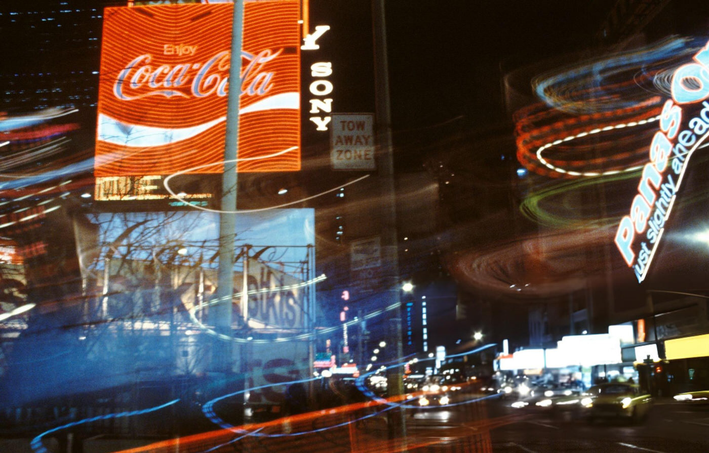 A Photo Montage Of A Coca-Cola Sign Amid The Bright Lights And Neon Signs Of Times Square, Circa 1980.