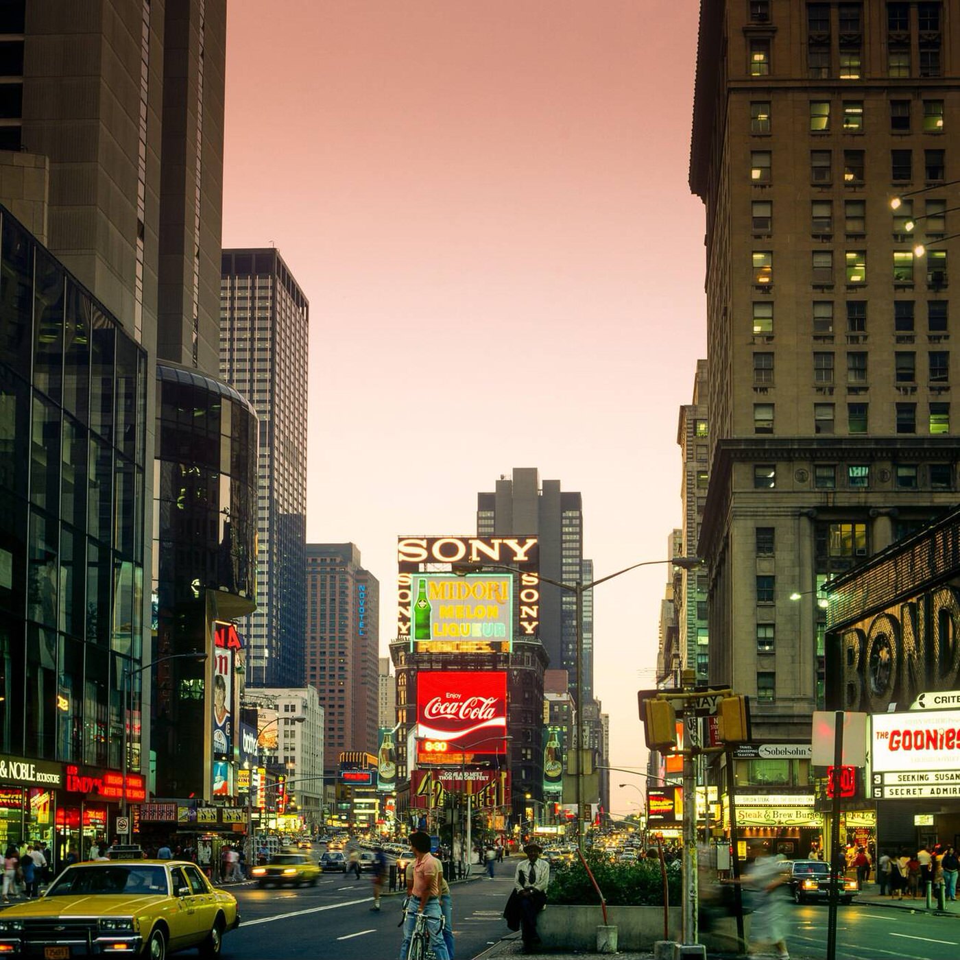 Times Square At Dusk, Illuminated Advertising Signs, Cars, People, Midtown Manhattan, July 1985.