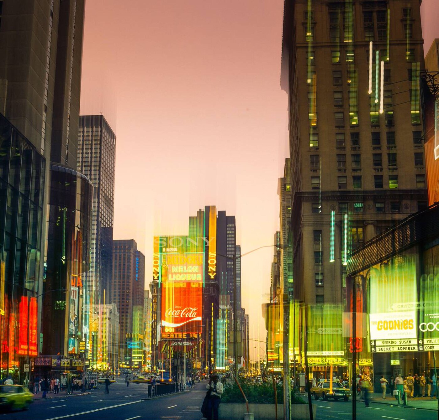 Times Square, Illuminated Advertising Signs, Cars, People, Motion Effect, Midtown Manhattan, July 1985.