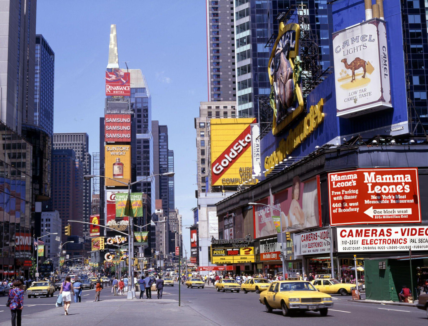 Advertisements At An Intersection In The Times Square District, New York City, Circa 1990.