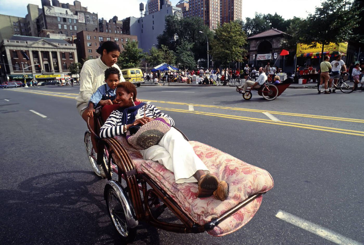 A Family Takes A Spin On &Amp;Quot;The Chaise&Amp;Quot; At An Alternative Transportation Festival In Union Square Park, 1992.