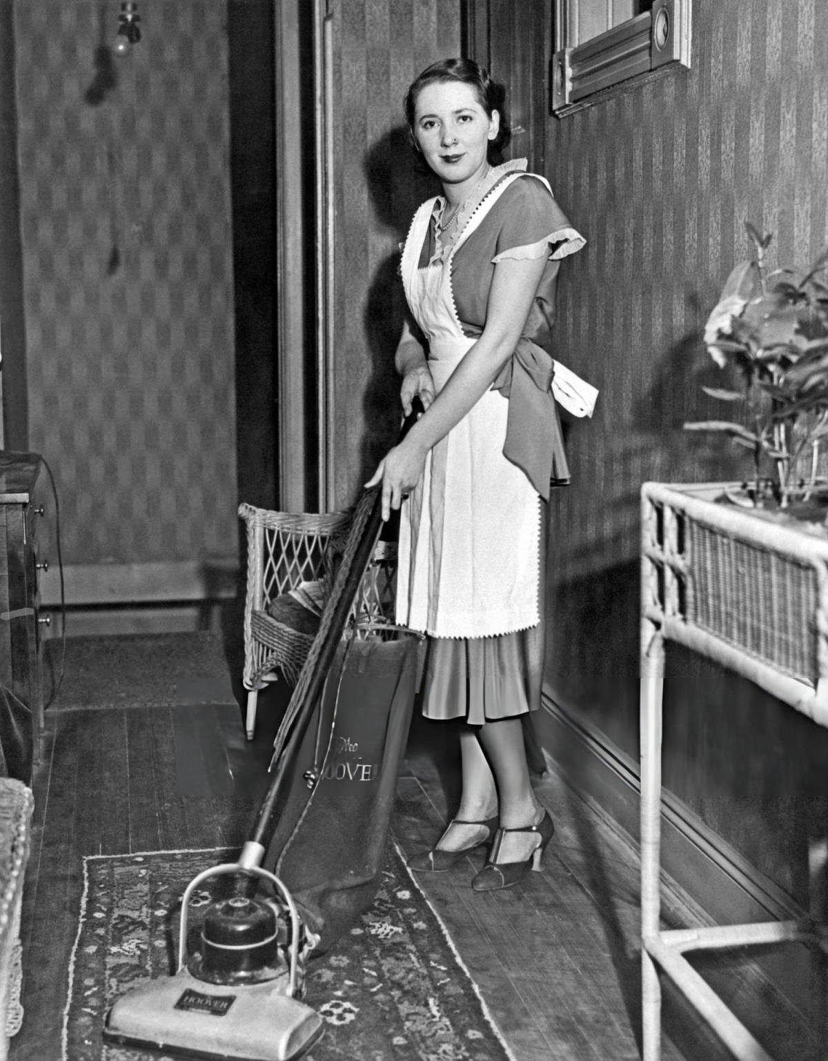Model Marie Bard Vacuuming In Astoria, Queens, 1929.