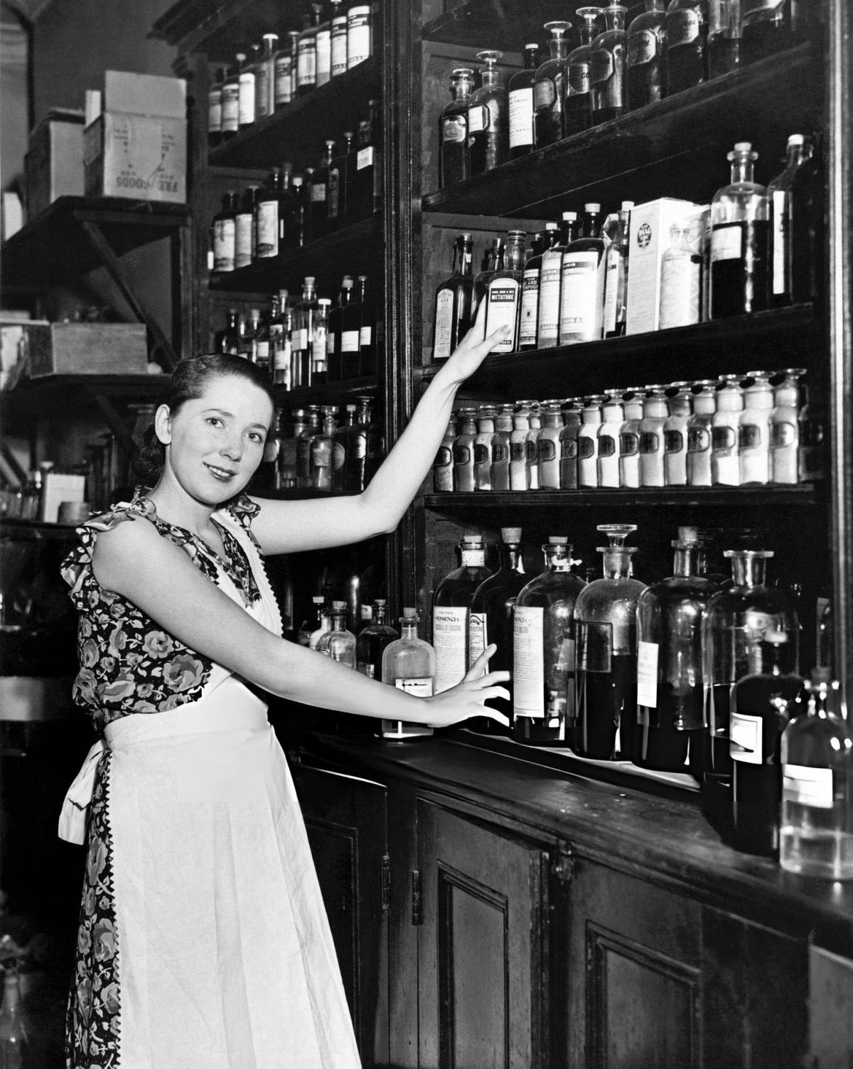 Model Marie Bard Helping Her Mother In A Drugstore In Astoria, Queens, 1929.