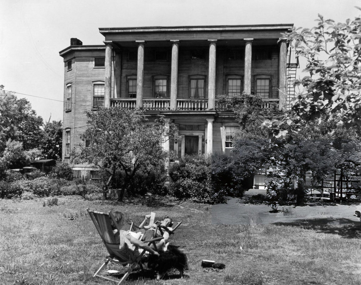 Two Women Lounging In Front Of The Blackwell House At 805 27Th Avenue, Astoria, 1937.