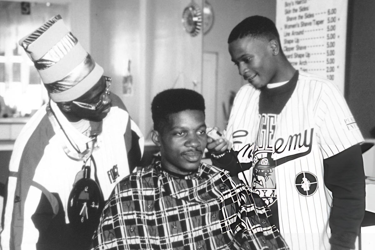 Flavor Flav Of Public Enemy Receiving A Haircut At His Barber Shop, New York, 1988.