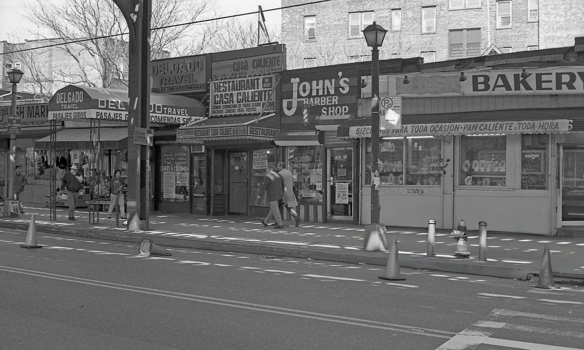 Delgado Travel, Restaurant Casa Caliente, And John'S Barber Shop On Roosevelt Avenue In Corona, Queens, 1990.