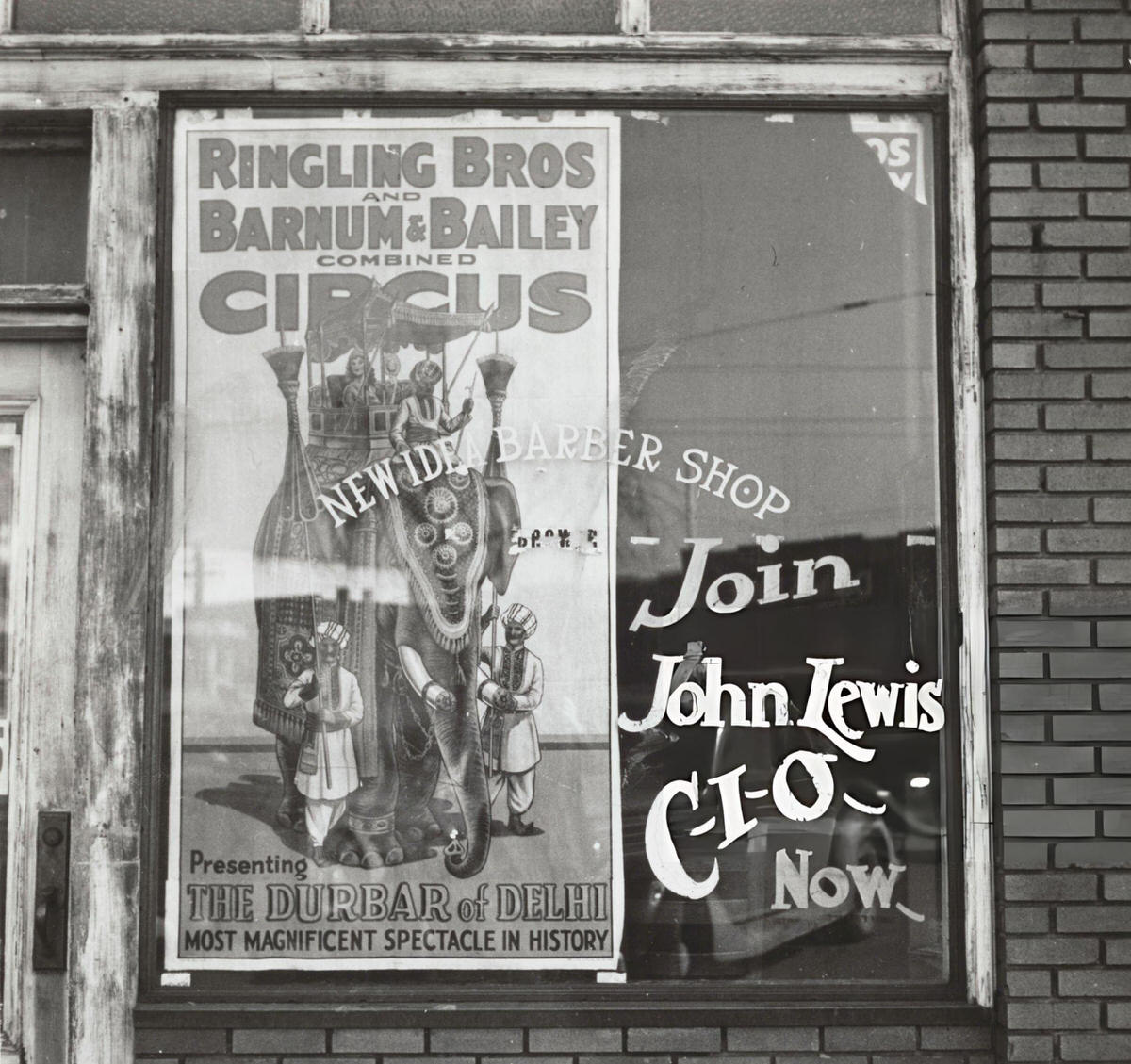 Barber Shop Window With A Circus Poster, 1937.