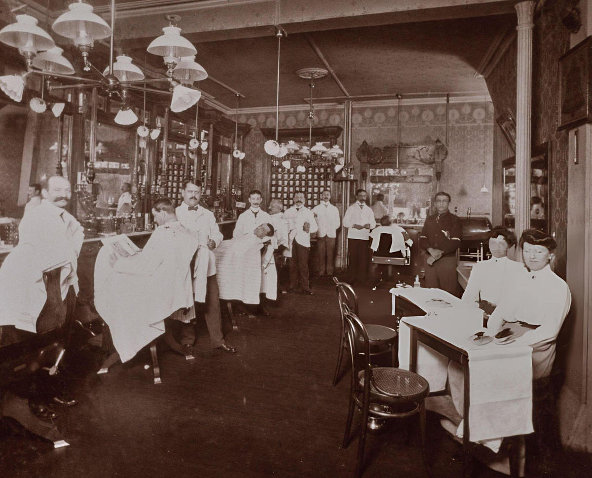 Barbers And Customers In A Barber Shop, New York, 1903.