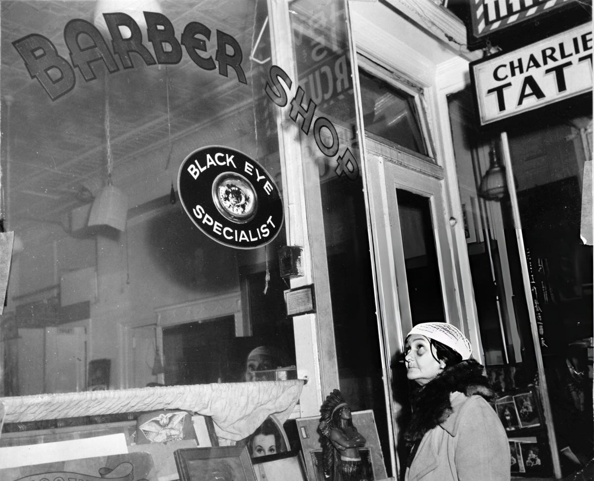 A Barber Shop Specializing In Black Eye Treatment, New York, 1943.